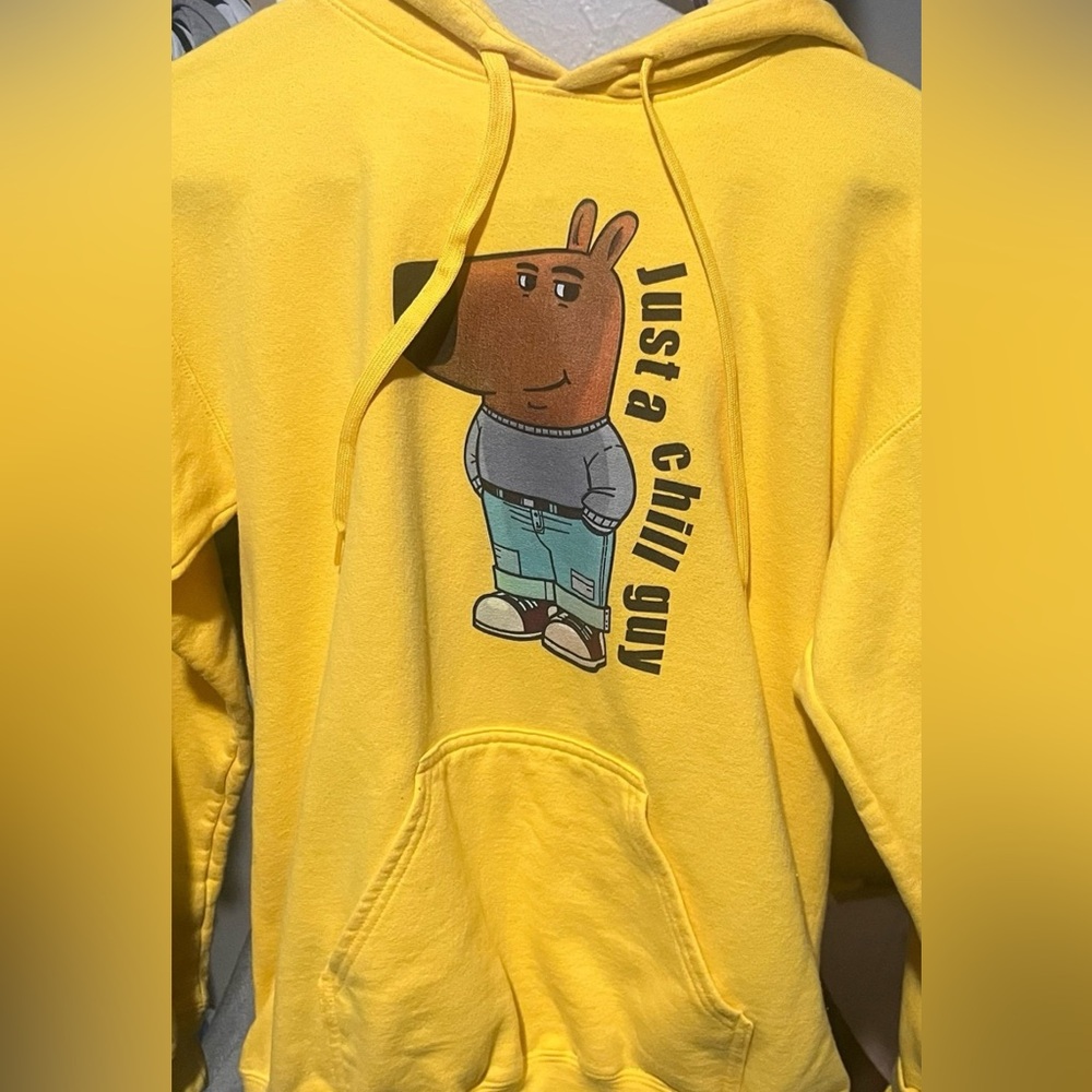 Yellow Hoodie with Cartoon Graphic